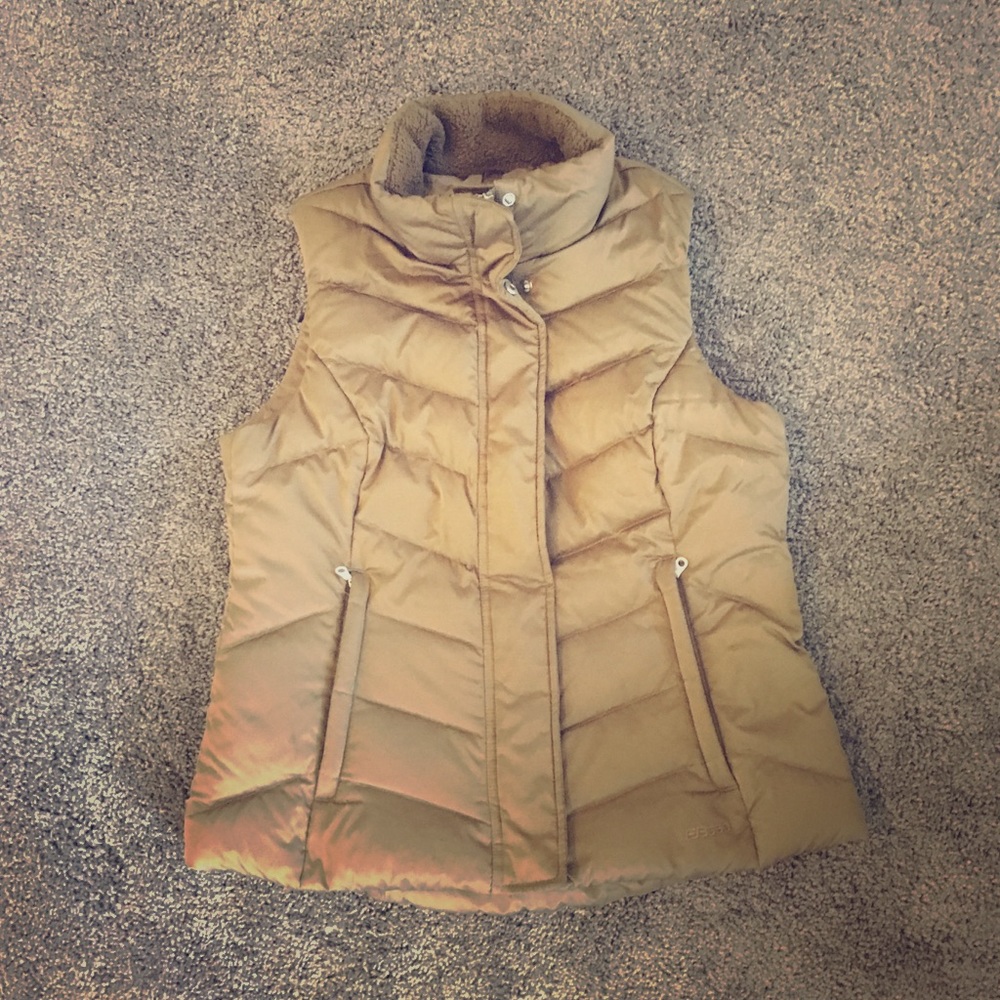 Eddie Bauer’s puffer vest, gold bronze color